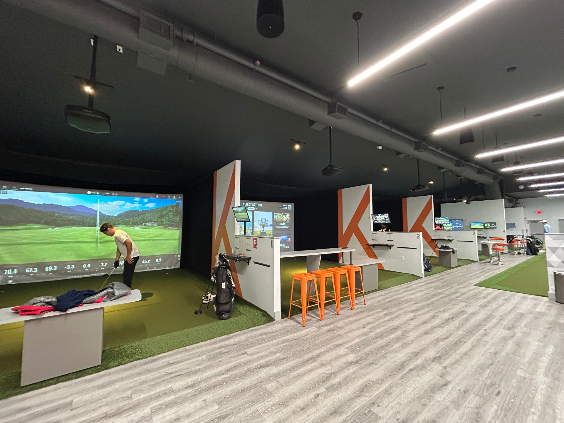 TrackMan indoor simulator bay at KOHR Golf in Natick, MA