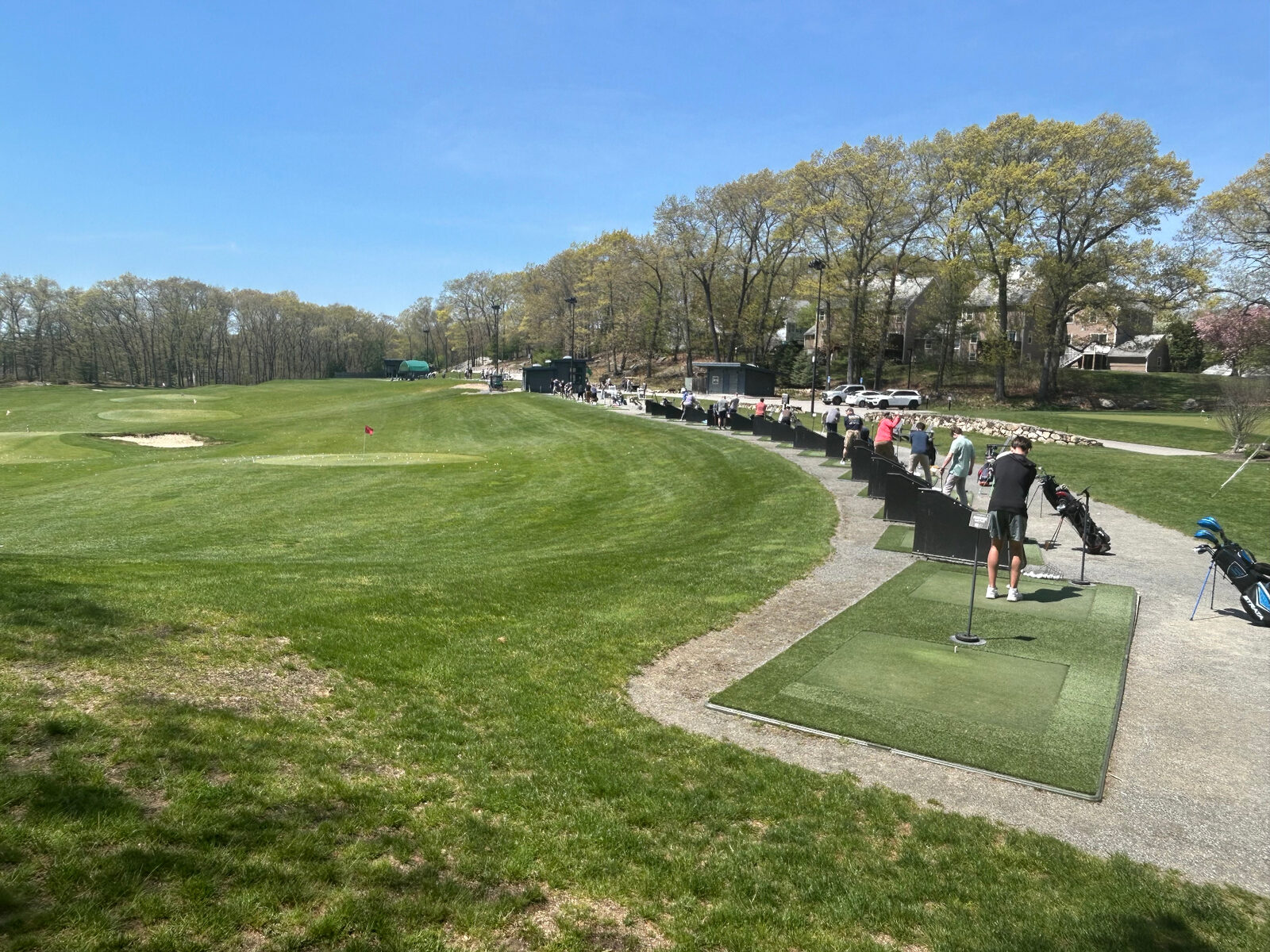 KOHR outdoor driving range with golfers